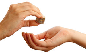 a hand is giving coin to another hand