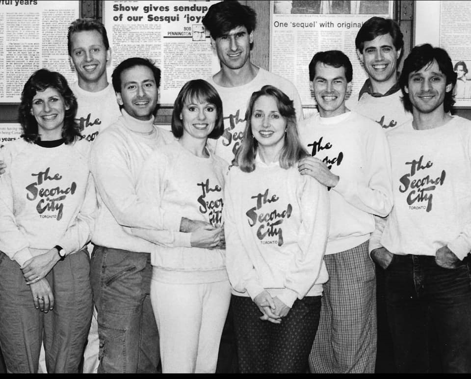 (Second City Touring Ensemble, c. 1985, left to right, Barb Muller, Tim Sims, Ed Sahely, Pat Yeatman, John Costello, Deb Jarvis, Peter Sherk, Randy Vancourt, Tom Melissis)